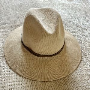 Anthropologie hat NWOT. Women’s adjustable hat, never worn. Color is cream.